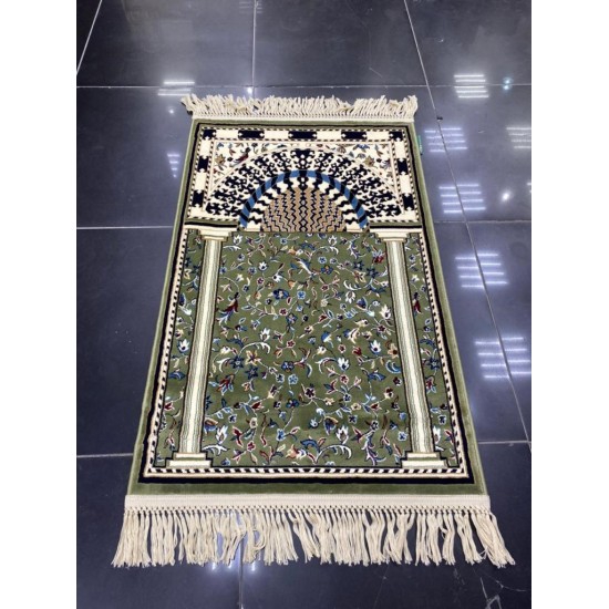 Green prayer rug inspired by the carpet design in Al-Rawdah Al-Nabawi Mosque