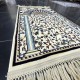 A prayer rug inspired by the carpet design in the honorable Rawda in the Prophets Mosque, Karim