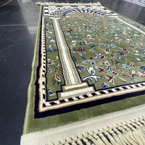 A prayer rug inspired by the carpet design of the Al-Rawdah Al-Sharifa in the Al-Nabawi Mosque