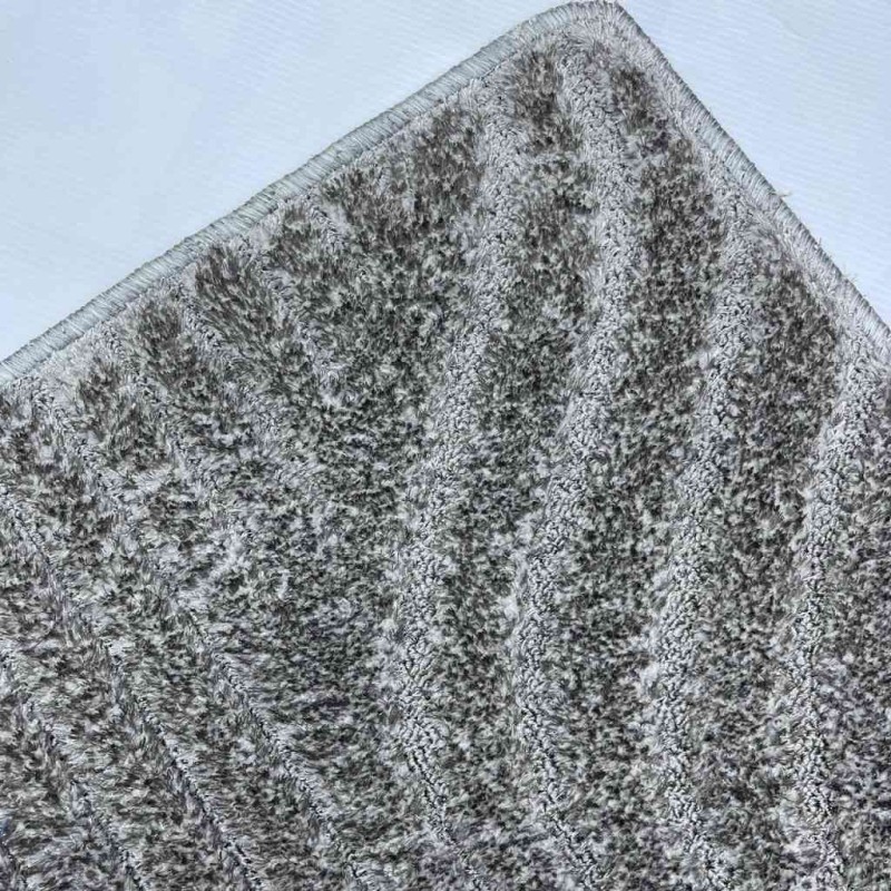 Plain gray Banta carpet measuring 100*100 square metres